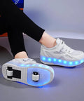 Upgrade Your Rides With Fresh Replacement Wheels For 2 In 1 Roller Skates Featuring Sick ABEC 5 Bearings This Complete Repair Kit Comes With Cover Plates And Tool Perfect For Kids Who Want A Smooth Roll Indoors Or Outside. White LED light-up shoes with rubber soles on feet, featuring a sleek design.