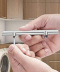 Hand holding Stainless Steel Hollow Tube T Bar Cabinet Handle Pack Of 30 Brushed Nickel Finish 150mm Overall Length