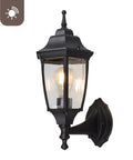 Photocell Dusk To Dawn Outdoor Wall Light With Weatherproof Die Cast Aluminum And Glass Hands Free Auto On Off Wet Location Rated E26 Base 60W Max Ideal For Porch Garage And Garden Black Finish showing side view with illuminated bulb.