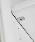 Close-up of Rock Solid Heavy Duty Metal Shelf Peg for wood shelving, showing smooth burr-free coating and precise fit.