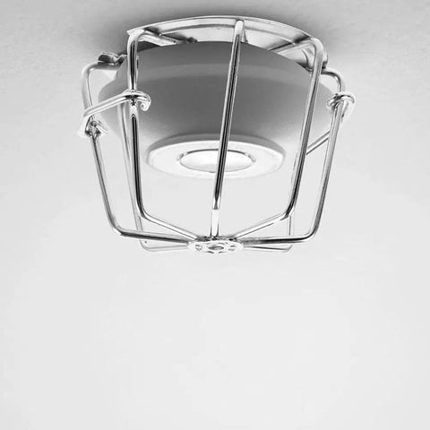 Fire Sprinkler Head Guard Protective Cover Cage Ceiling Impact Resistant Shield installed on a ceiling.