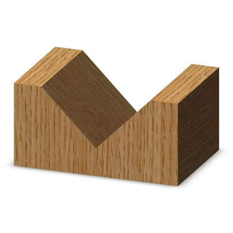 Wooden block showing a V groove cut made by Pro Grade V Groove Router Bit 90 Degree One Inch Cutting Diameter For Engraving Sign Making.