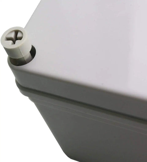 Weatherproof Outdoor Electrical Junction Box 10 by 8 by 4 Inches IP65 Dustproof and Waterproof Enclosure Built Rugged and Tough As Nails For Outdoor And Indoor Use Wall Mount Polystyrene Plastic With Rubber Seal Universal Conduit Box close-up corner and screw