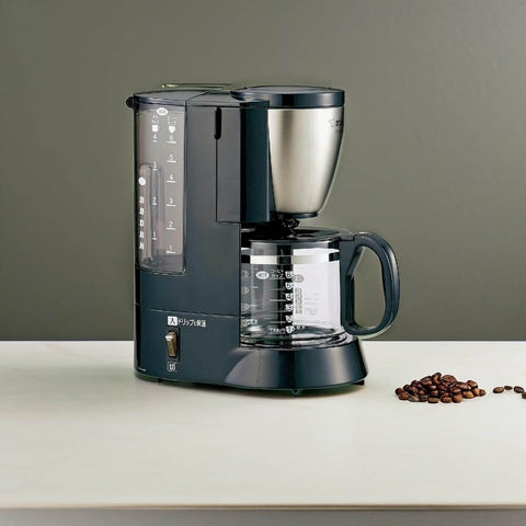 Black Stainless Steel Coffee Maker With 6 Cup Mesh Filter EC AS60 XB No Fuss Auto Brew For Rich Flavor And Quick Morning Wake Up Easy Clean Design For Home Use showing side view.