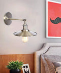 Heavy Duty Adjustable Wall Sconce With Sleek Up Down Shade And E27 Socket For Bedroom Reading Lights And Hallways featuring a brushed metal design.