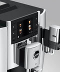 Level Up Your Daily Grind With This Sleek Chrome Automatic Coffee Machine Boasting One Touch Operation Built In Grinder And Rich Foam Frother For A Real Deal Barista Experience Certified Refurbished close-up of the control panel and chrome frother.