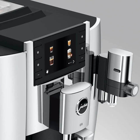 Level Up Your Daily Grind With This Sleek Chrome Automatic Coffee Machine Boasting One Touch Operation Built In Grinder And Rich Foam Frother For A Real Deal Barista Experience Certified Refurbished close-up of the control panel and chrome frother.