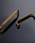Antique Brass Cabinet Pulls Set Of 20, 6.25 Inch Kitchen Cabinet Handles on reflective surface