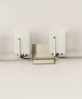 Dart 4 Light Bath Vanity Fixture In Satin Nickel Steel Finish With Satin White Glass Shades, mounted on wall, front view
