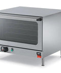 Heavy Duty Electric Convection Countertop Oven Is A Total Kitchen Workhorse Wraps Four Non Tip Shelves For Half Size Sheets Crushes Broil Bake Tasks Dual Wall Insulation Cool Grip Doors And Polished Stainless Steel Setup.