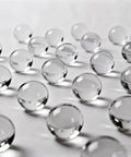 Pro Grade Quartz Spherical Lens For Optics, Circular Glass Accessory For Makers, 5mm Diameter, showcasing multiple lenses on a surface.