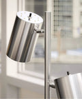 Close-up of brushed steel spotlight on Ultra Tall Industrial Tree Floor Lamp With Three Adjustable Spotlights, 64 Inches High.