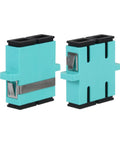 Close-up of two aqua blue Six Pack SC Female To SC Female OM3 Duplex Multimode Fiber Optic Couplers And Adapters, panel mount ready