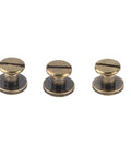 Close-up of 8Mm Flat Head Copper Brass Screws Nuts Rivets Set for Leather Craft, showing three brass screws with flat heads.