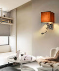 Totally Adjustable Swing Arm Wall Sconce With Soft Fabric Shade And Classic E27 Mount Smooth Painted Steel Frame in a cozy reading nook.