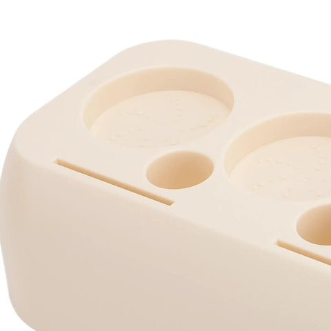 Close-up of Heavy Duty Abs Coffee Tamper Station Built Tough For The Daily Grind ergonomic surface and portafilter fits.
