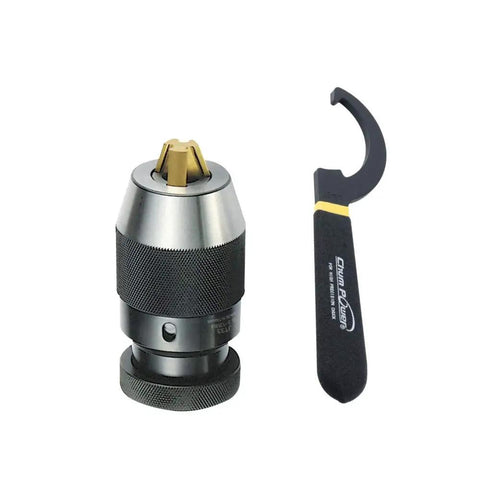 Heavy Duty Keyless Drill Chuck 1/64 To 1/2 Inch Clamping Range With JT33 Mount And Titanium Jaws next to adjustment spanner.