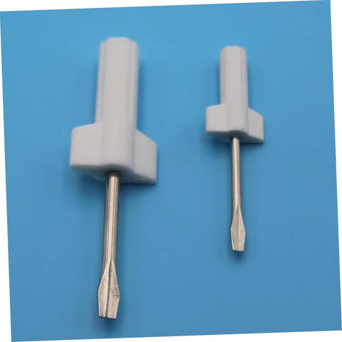 4 Piece Metal Flathead Screwdriver Set For Sewing Machines And Home Repairs, two white-handled screwdrivers on blue surface