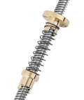 Close-up of Beefed Up T8 Threaded Rod Screw Lead Screw with Anti Backlash Nut Spring Loaded Stainless Steel Nut for 3D Printers.