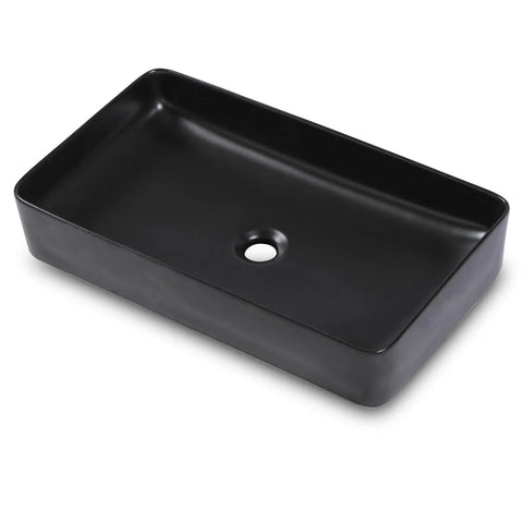 Rectangular black porcelain vessel sink, sleek above counter design, ideal for modern bathrooms, 24 by 14 inch durable ceramic basin.