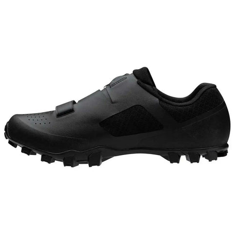 Side view of X Alp Mesa Mountain Bike Shoe For Men Black Size 45 with durable toe cap and grippy rubber sole for backcountry rides.