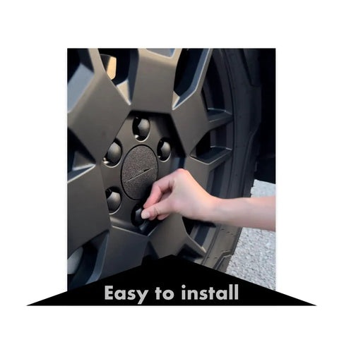 Hand installing Dope Wheel Center Caps And Lug Nut Covers For Cybertruck Matte Black 4 Pcs Center Cap Kit And 24 Lug Nut Covers