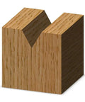 Pro Grade Solid Carbide V Groove Router Bit With Sixty Degree Included Angle One Quarter Inch Shank Kicks Butt On Woodworking Sign Carving and Furniture Detailing Tasks, demonstrating a clean V-notch cut in wood.