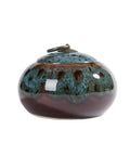 Sweet Ceramic Tea Canister For Loose Leaf Bin Plus Kitchen Pantry Setup Keep Your Morning Coffee Beans Or Afternoon Snack Stash Fresh With This Solid Airtight Jar That Locks Flavor Up Tight, round ceramic jar in blue and brown.