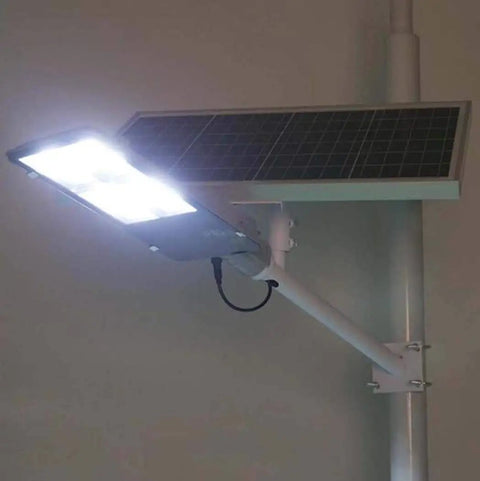 JUDYSSY Solar Floodlights,Led Street Light mounted on a pole with a solar panel, providing bright illumination.