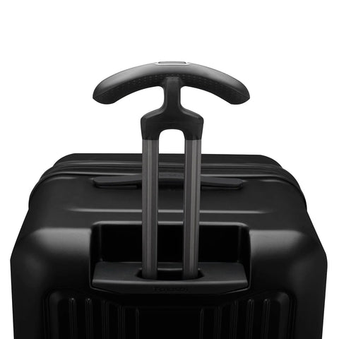 Close-up of matte black durable spinner luggage handle for frequent flyers