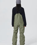 Back view of person wearing Waterproof Ski Bibs Men Winter Snow Pants Overalls Snowboarding Outdoor Sports.