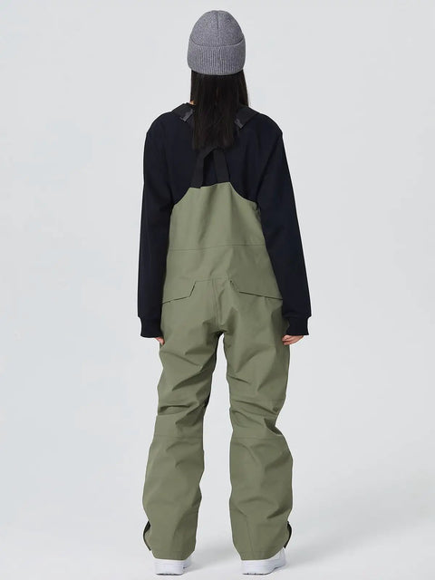 Back view of person wearing Waterproof Ski Bibs Men Winter Snow Pants Overalls Snowboarding Outdoor Sports.
