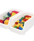 Set Of Six Crisp White Stackable Storage Bins Featuring Lockdown Grip Base And Crystal Clear Front Panels To Kick Pantry Chaos To The Curb And Tame Craft Tables filled with colorful building blocks.