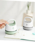 Fuss Free Rechargeable Desktop Vacuum Cleaner That Knocks Dust And Pet Hair To The Curb In Seconds, lightweight portable with USB.