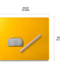 Yellow silicone baking mat with rolling pin and dough scraper, dimensions 66cm x 56cm. Kitchen tools for pastry making.