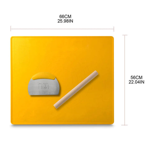 Yellow silicone baking mat with rolling pin and dough scraper, dimensions 66cm x 56cm. Kitchen tools for pastry making.