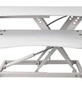 Stylish White Standing Desk Converter With Smooth Gas Spring Lift For Laptop Or Monitor, side view showcasing lift system and design.