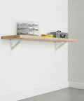 Fast Install White Iron Shelf Brackets For Floating Shelves with mounted wood shelf in room setup