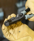 Close-up of 9 Inch Journeyman High Leverage Side Cutting Pliers With Crimper Fish Tape Puller And Wire Stripper in use, Induction Hardened Blades Made In USA
