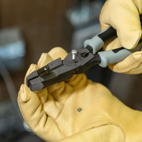Close-up of 9 Inch Journeyman High Leverage Side Cutting Pliers With Crimper Fish Tape Puller And Wire Stripper in use, Induction Hardened Blades Made In USA