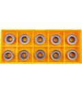 11-piece RPMT1204MOE carbide milling inserts set in a yellow plastic organizer tray