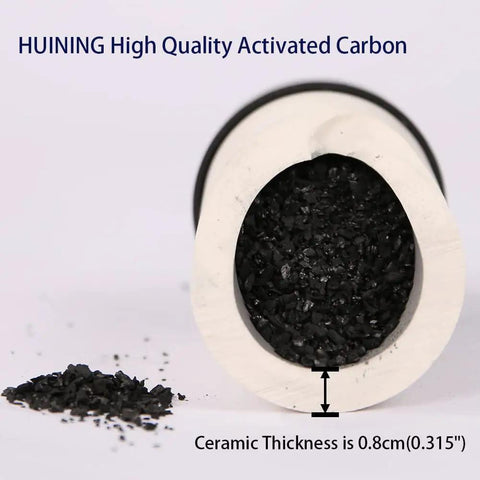 Close-up of 7 inch ceramic filter candle with activated carbon for countertop gravity water filter systems.