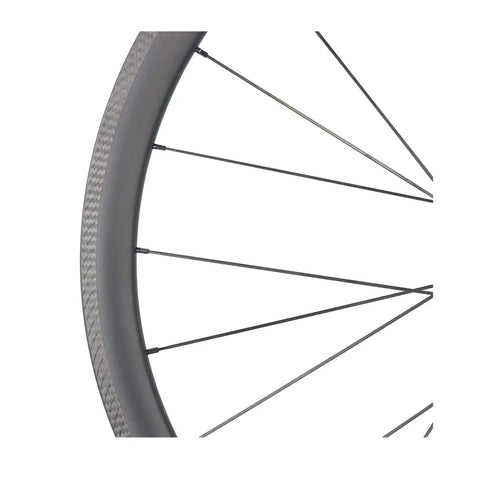 Close-up of 38mm aero rim and pillar spokes on Dope 700C Carbon Clincher Wheelset With 38mm Aero Rim Tubeless Ready Road Bike Wheels For Rim Brake