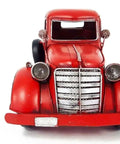 Front view of Red Metal Truck Christmas Decor For Indoor And Outdoor Holiday Cheer With Vintage Rustic Farmhouse Style Pickup Truck Ornament