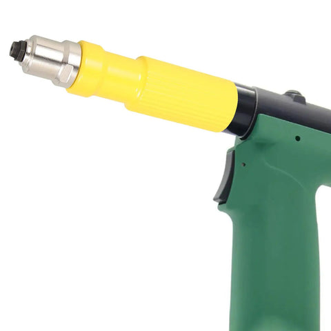 Premium Cordless Rivet Adapter Kit For Hand Tools With Easy Installation And Versatile Riveting Applications To Make Your DIY Projects Go Super Sleek And Smooth. Close-up of yellow metal rivet adapter on green cordless drill