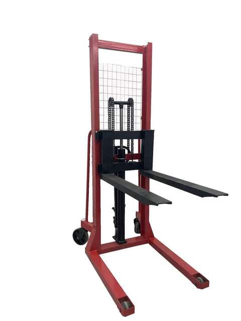 Heavy Duty Manual Pallet Stacker Featuring A No Sweat 2200 Pound Hydraulic Lift And Sixty Three Inch Rise For Warehouse Grinds And Factory Material Hauling Straight Up Shop Floor Legend, red metal frame with black forks.