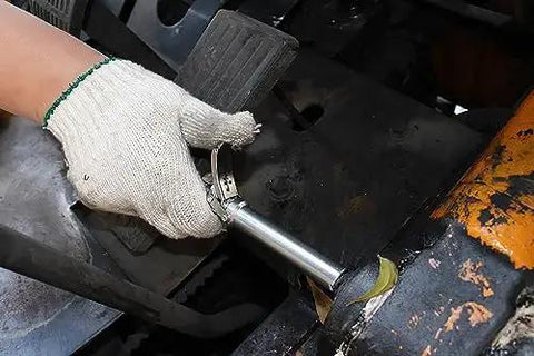 Heavy Duty Quick Release Grease Coupler XL for 1 8 NPT Fittings, Hands Free Latching, Easy Quick Connect in use with machinery