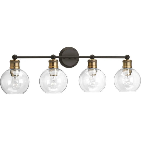 Coastal Four Light Bath Vanity Light With Clear Glass Globes In Antique Bronze Finish, Industrial Modern Style, front view
