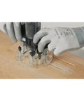 Installed Dremel 335-01 plunger router attachment with clear plastic base plate routing wood