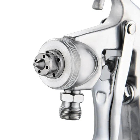 Close-up of the nozzle of a Heavy Duty Pneumatic Spray Gun With Swappable Cups For Slick Home Painting Projects.
